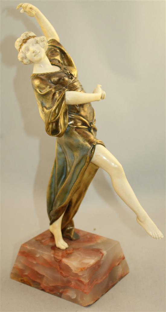 Eduardo Rossi (1867-1926). An Art Deco ivory and gilt bronze figure Oriental Dancer, overall 16.5in.